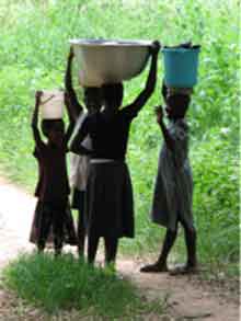 girls carrying water